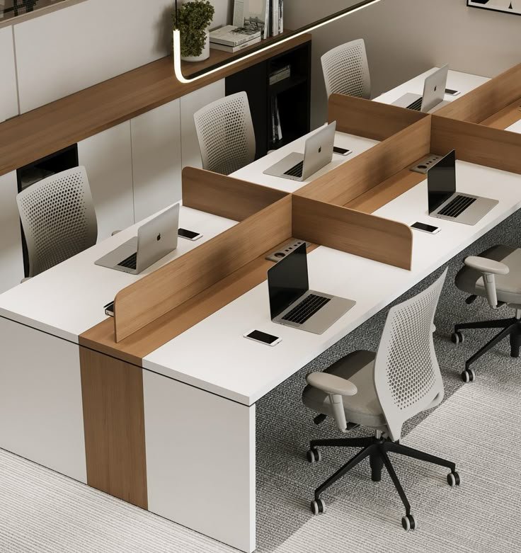 Modern commercial office workstations with timber dividers