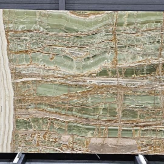 Marble Collection — Green onyx slab with amber banding