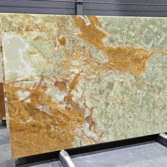 Marble Collection — Golden-green onyx slab with warm amber veining