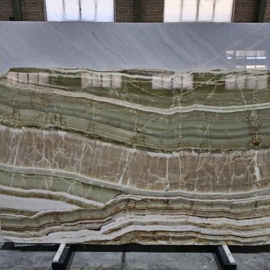 Marble Collection — Layered green onyx slab with cream and olive bands
